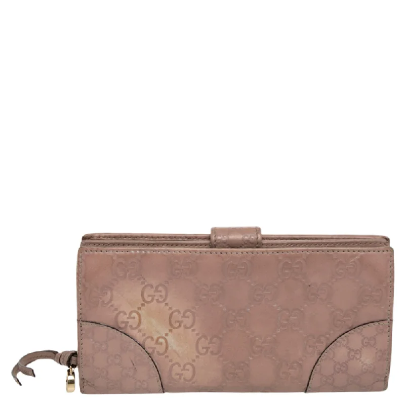 Classic wallets for women with floral patterns -Gucci Beige Guccissima Leather Bree Bifold Wallet