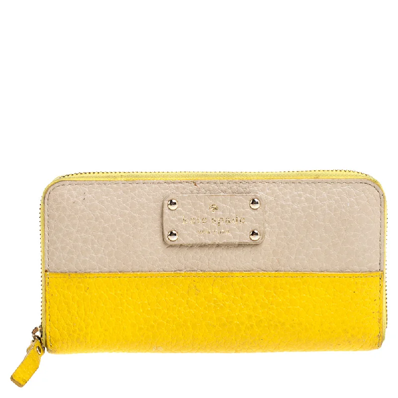 Women’s wallets with extra zippered compartments -Kate Spade Yellow/beige Leather Grove Court Lacey Zip Around Wallet..