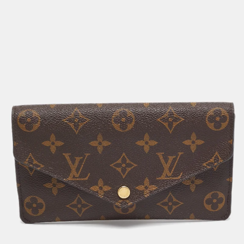 Fashionable wallets for women with snap closure -Louis Vuitton Monogram Canvas Sarah Wallet..