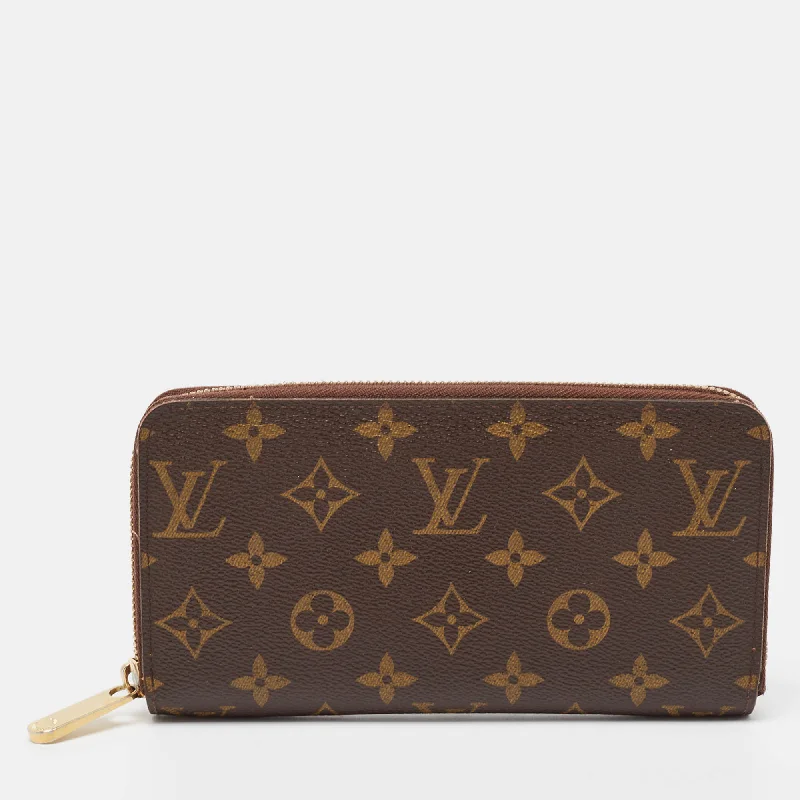 Slim wallets with a minimalist design -Louis Vuitton Monogram Canvas Zippy Wallet..