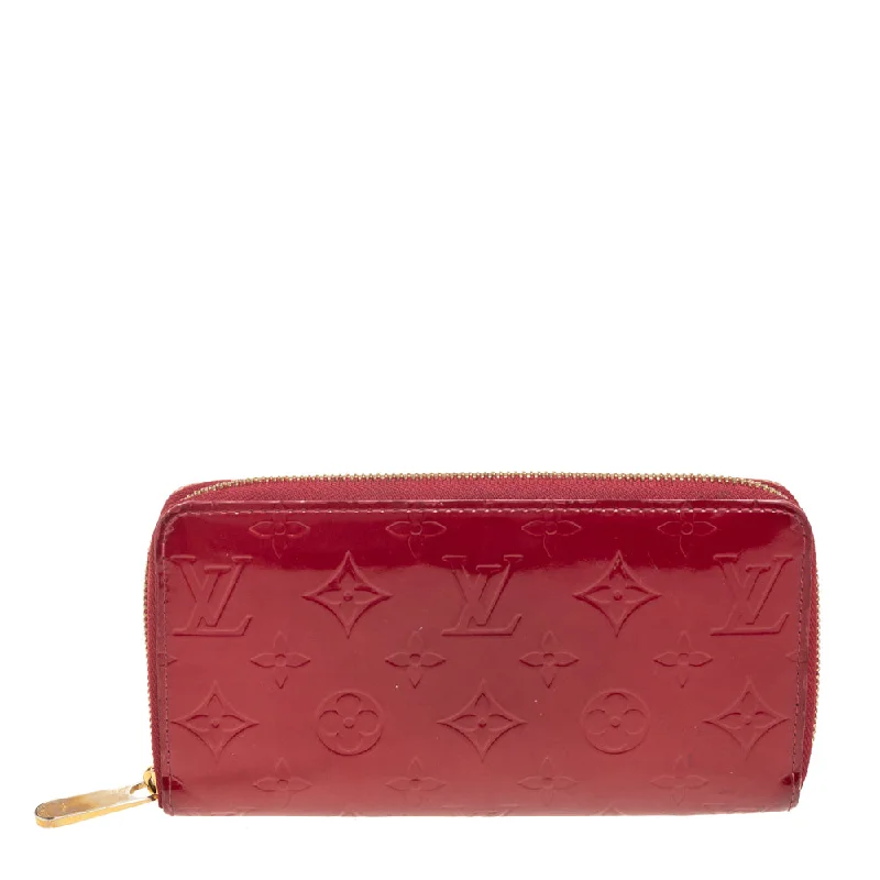 Wallets with plenty of space for receipts -Louis Vuitton Pomme D’amour Monogram Vernis Zippy Wallet..