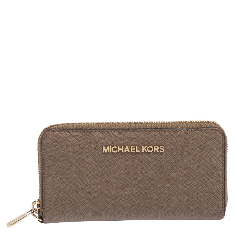 Eco-friendly wallets for men and women -Michael Kors Beige Leather Zip Around Wristlet Wallet..