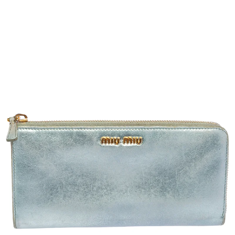 Wallets with eco-conscious materials -Miu Miu Metallic Blue Leather Zip Around Wallet..