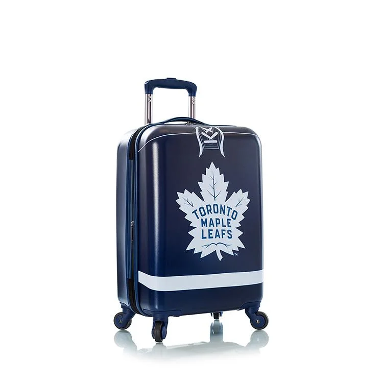 Suitcase with rugged use-Heys NHL 21" Toronto Maple Leafs Carry On Spinner Luggage